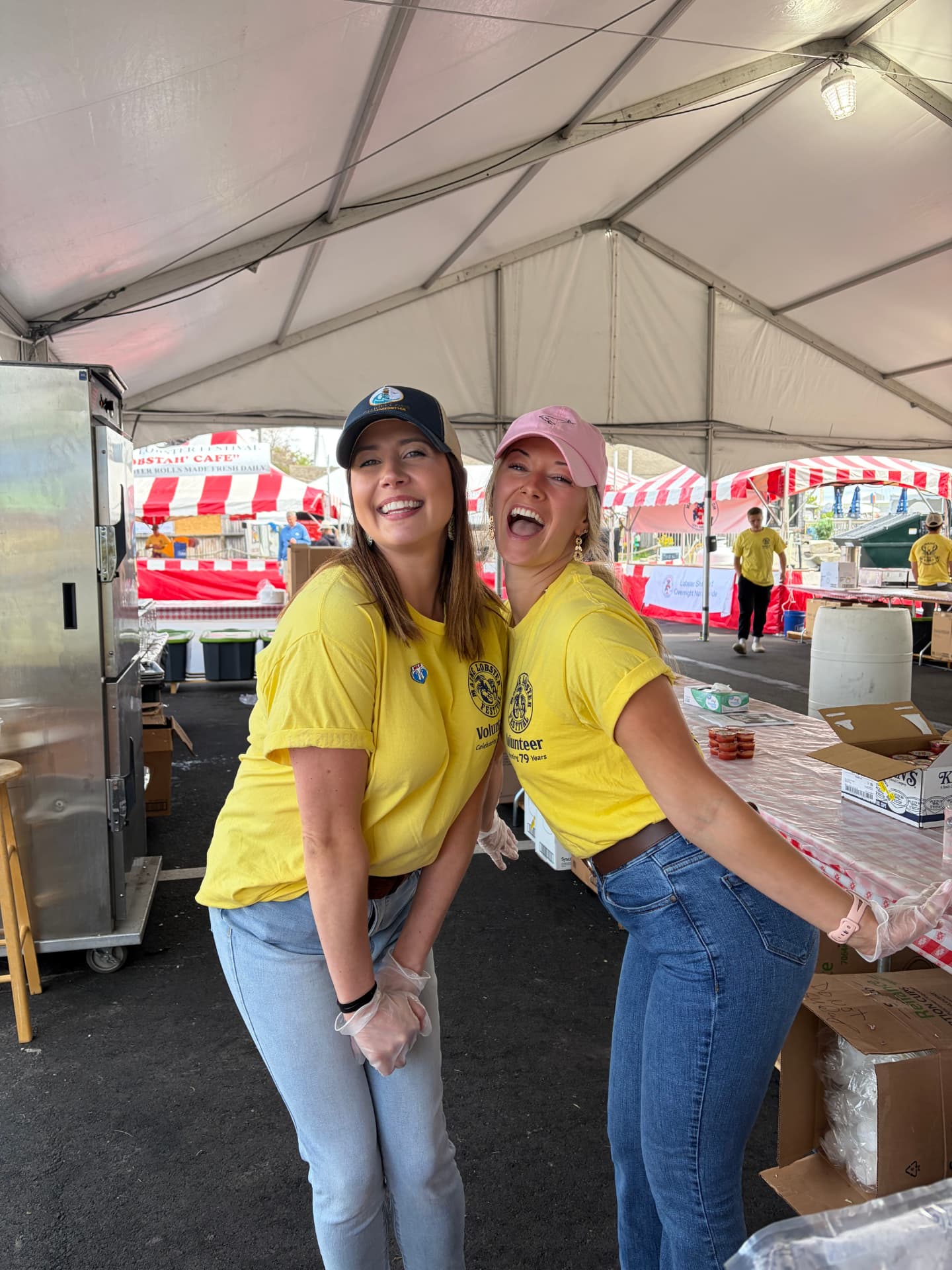 Two Granite Coast Orthodontics team members volunteering at the Maine Lobster Festival