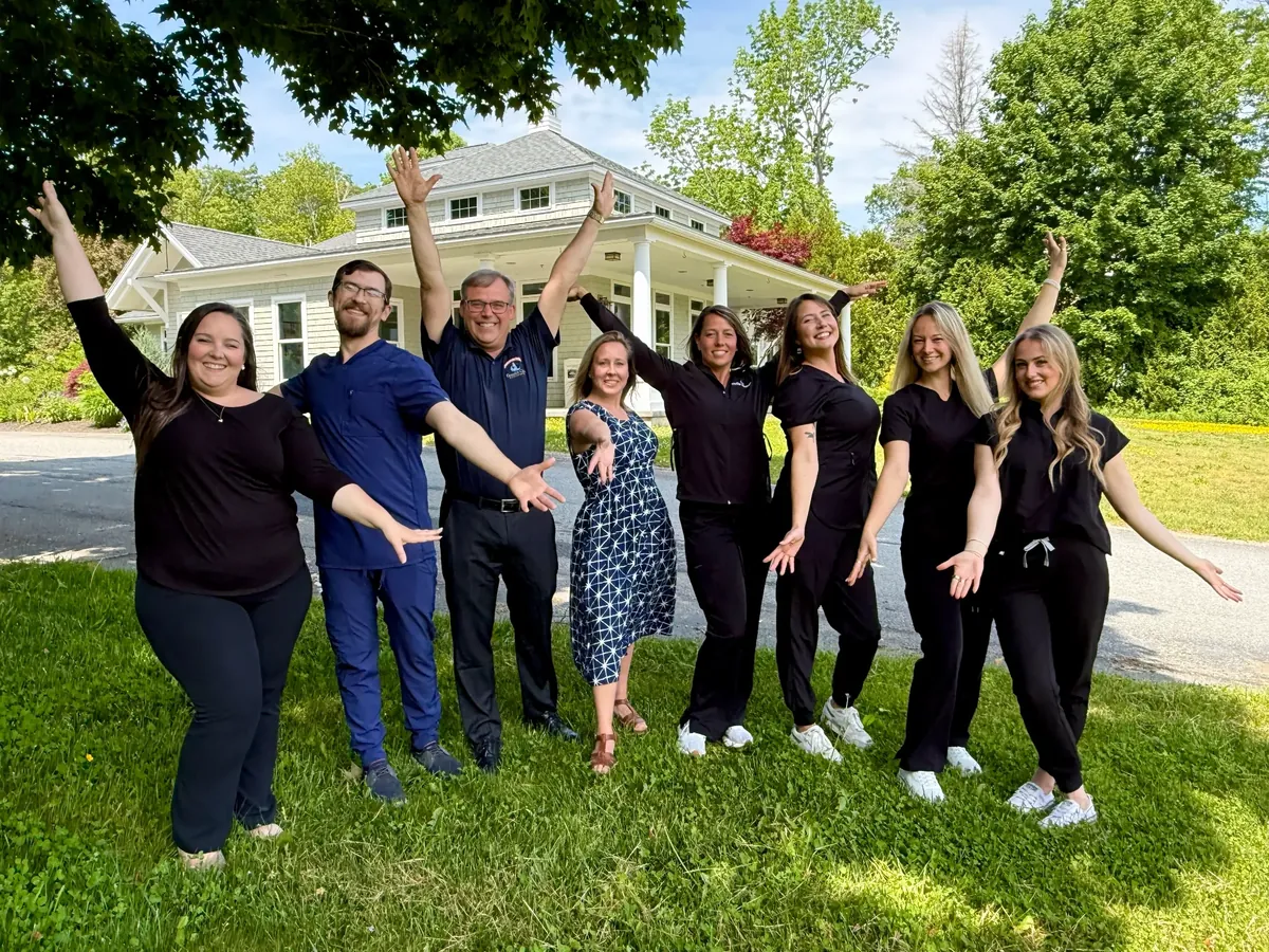 Granite Coast Orthodontics team outside the office