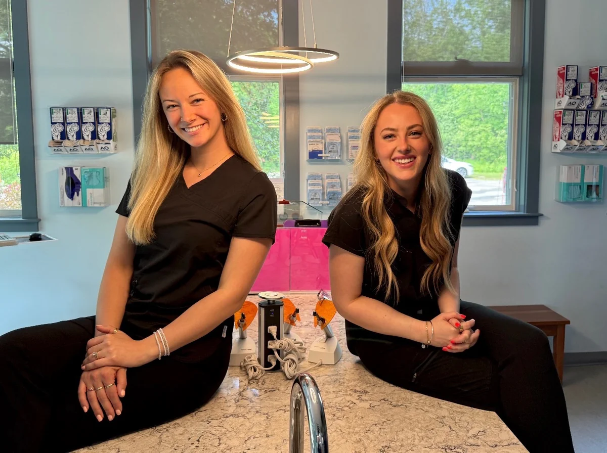 Granite Coast Orthodontics team photo in front of the office